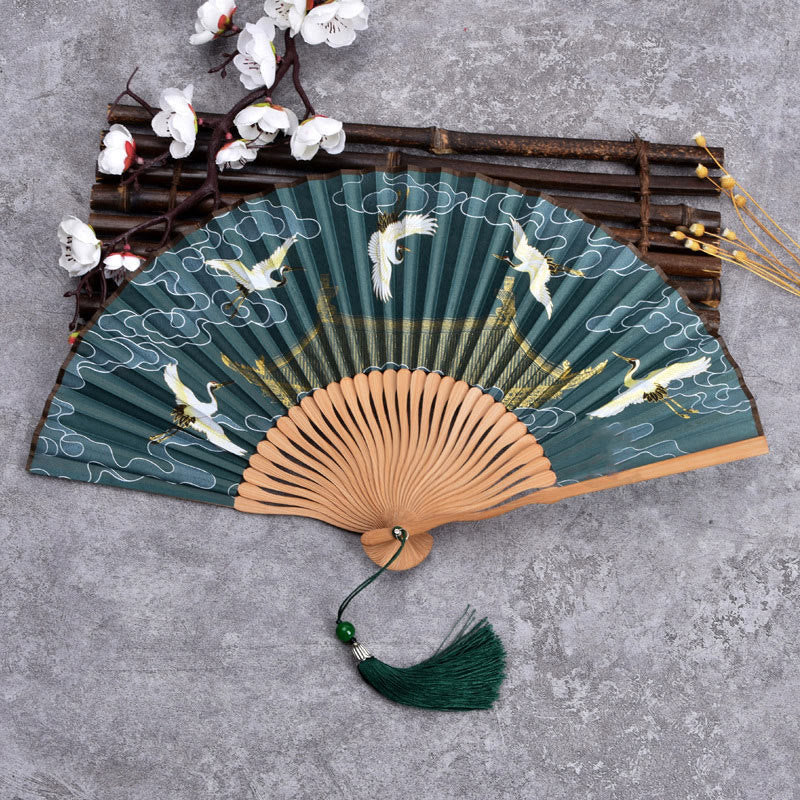 Bambus-Faltfächer mit Buddha-Motiven, Kranichen und Glückswolken im einfarbigen Farbverlauf