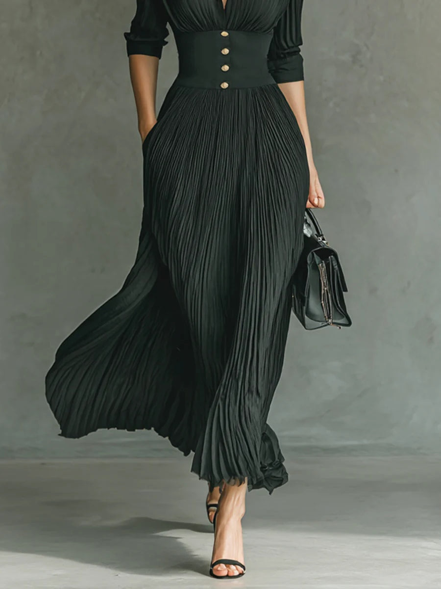 Elvire | Lange Plissierte Robe mit Revers und Hoher Taille" can be rewritten as:

"Elvire | Elegante Lange Plissierte Robe mit Revers und Hoher Taille
