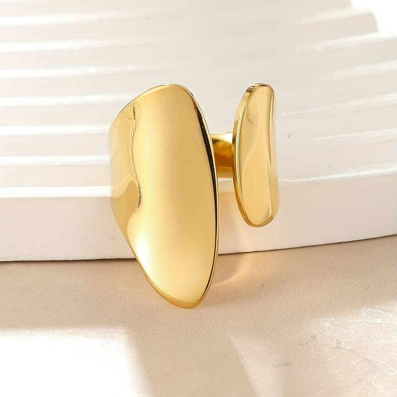 "Offener Vintage-Goldring" could be rewritten as "Vintage Gold Ring mit Offenem Design".